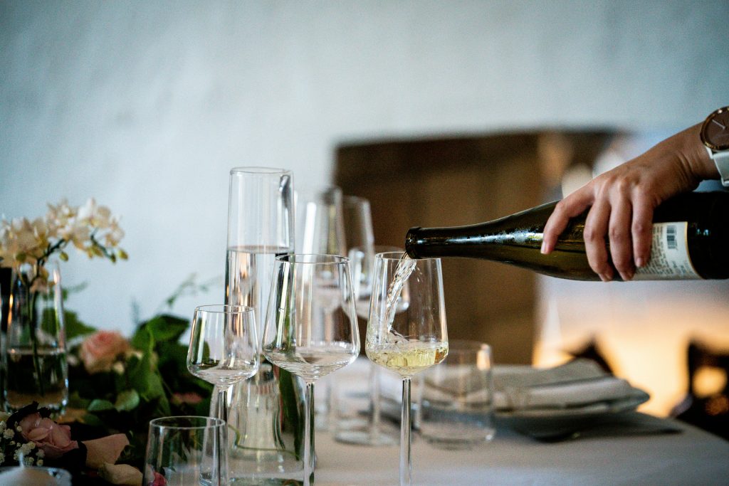 White Wine Tasting, pouring a glass of white wine